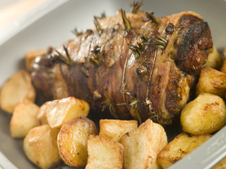 Roast Leg of Lamb Studded with Garlic and Rosemary and Roast Pot