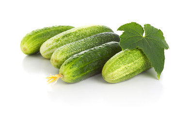 Fresh cucumbers isolated over white