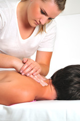 Obraz na płótnie Canvas back massage at the spa and wellness center