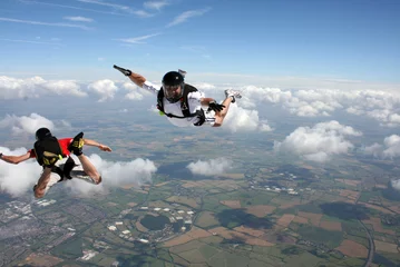 Fototapeten Two Skydivers in freefall © Joggie Botma