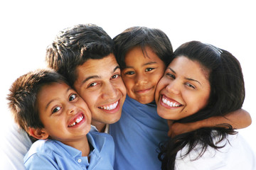 Happy Family Embracing & Laughing Together Outdoors