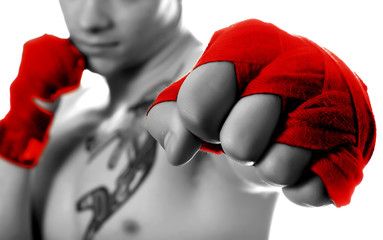 Street fighter isolated on white (focus on fist)