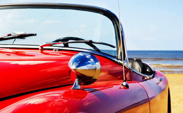 Old Classic Red Jaguar At Beach