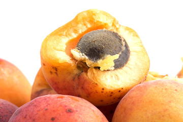 Fresh appetizing apricots on a white background