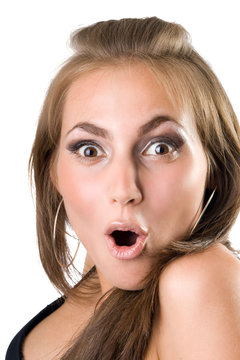 portrait of the beautiful young surprised girl. Isolated