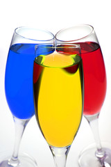 colored cocktail over white