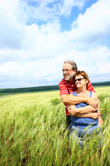 Senior couple in a field
