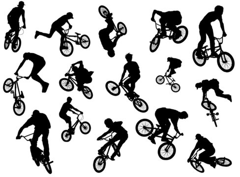 Black silhouettes of bmx and mtb riders