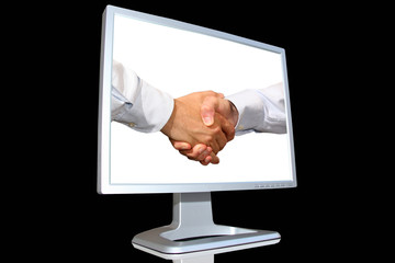 stretta di mano in monitor lcd