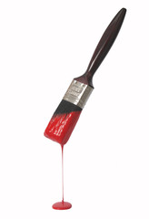 Paintbrush and red paint dripping, on white.