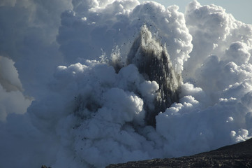 Fototapeta na wymiar Kilauea Volcano enters ocean, Kalapana, Hawaii