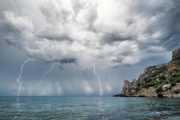 Lightning and thunderstorm above sea