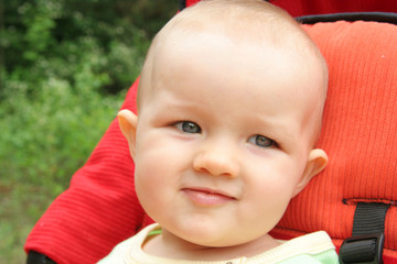 child in baby carriage