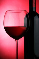 Glass and bottle of red wine