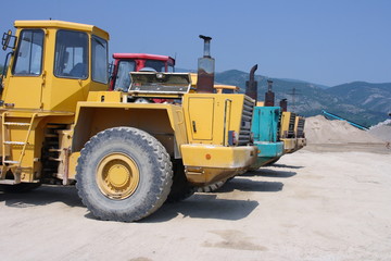 Parked diggers in a gravel pit