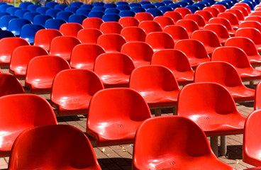 Empty red and blue seats