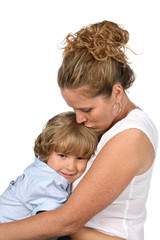 mother kissing son's head