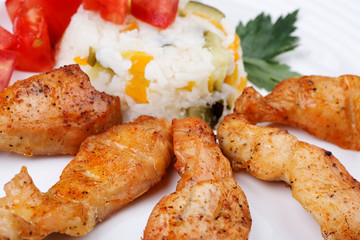 Grilled meat with rice and vegetables