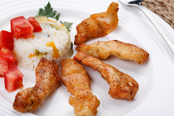 Grilled meat with rice and vegetables