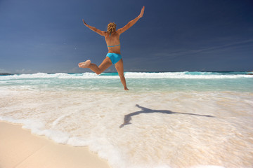 backview of jump over water