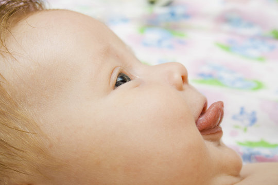 Baby With Tongue Hanging Out