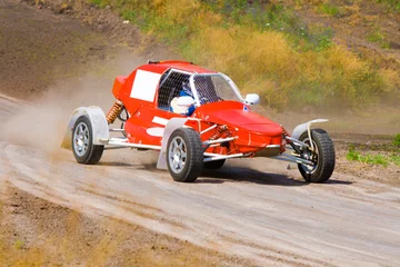 Cercles muraux Sport automobile Red racing buggy on track