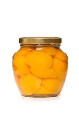 Jar with peaches isolated on the white
