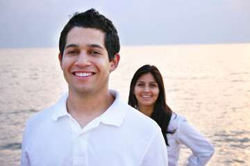 Obraz premium Young People at the Beach