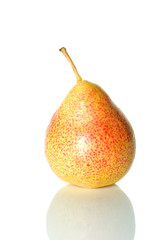 Single spotty yellow-red pear isolated on the white background