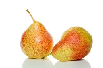 Pair of spotty yellow-red pears isolated on the white background