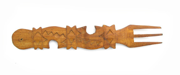 Indian carved wooden fork isolated on white