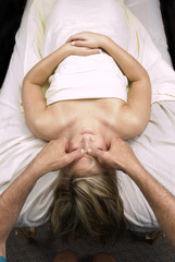 Obraz na płótnie Canvas Woman getting a facial massage