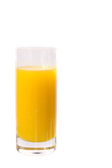 Fresh squeesed orange juice in a glass bathed in sunshine and po