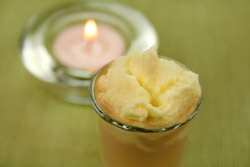 After dinner coffee liqeur with cream and a candle.