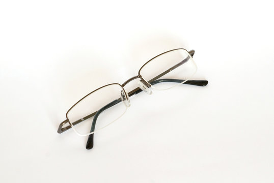 Transparent spectacles isolated on white.