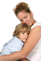 mother with eyes closed and holding son