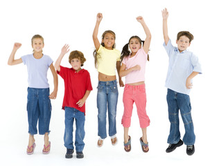 Fototapeta premium Five friends jumping and smiling