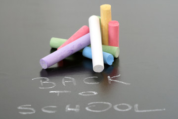 close-ups of blackboard and colorful chalks