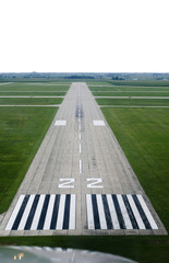 Looking down the runway of a rural airport.