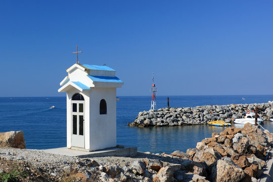 The entrance of the little port of Agiokampos, Greece