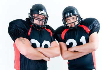 Two American football players isolated on white background