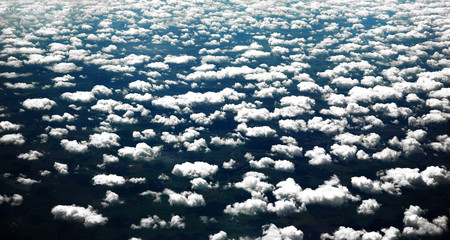 White clouds. View from the window of the plane.