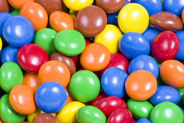 Fototapeta na wymiar Asortyment Kolorowe cukierki czekoladowe tła