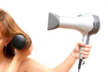 female hand holding hairdryer over white background