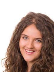 studio portrait of a beautiful smiling teen girl