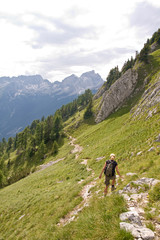 Fototapeta na wymiar female hiking in the alps, slovenia