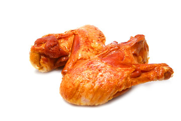 two roasted turkey wings isolated over white