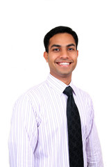 Young Indian business man smiling.