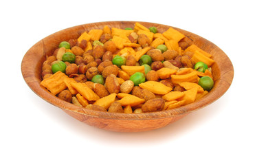 Mixed snack food in wooden plate