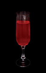 Wineglass on black background, rose wine
